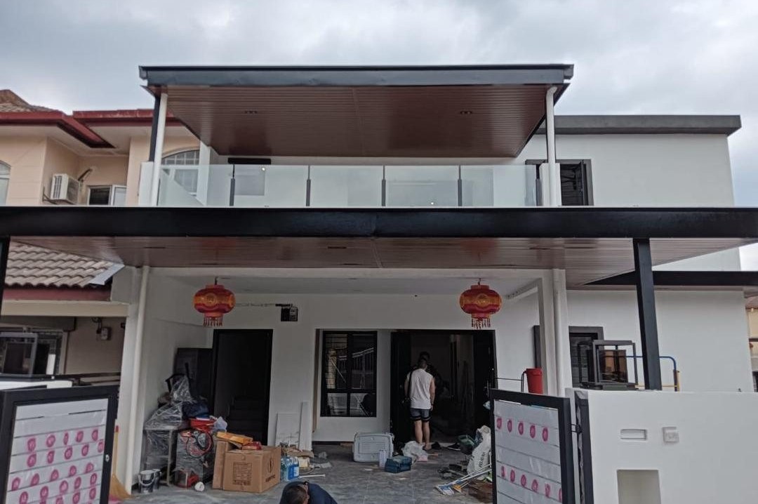 Two-storey steel awning and glass balcony railing